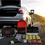 Car on road with safety kit displayed. 